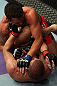 LOS ANGELES, CA - AUGUST 04:  Jamie Varner takes down Joe Lauzon in their lightweight bout during the UFC on FOX at Staples Center on August 4, 2012 in Los Angeles, California. Lauzon won by way of submission by triangle choke.  (Photo by Josh Hedges/Zuffa LLC via Getty Images)