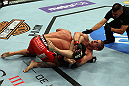 LOS ANGELES, CA - AUGUST 04:  Joe Lauzon secured submission by Jamie Varnerin the triangle choke in the third round during the UFC on FOX at Staples Center on August 4, 2012 in Los Angeles, California.  (Photo by Josh Hedges/Zuffa LLC via Getty Images)