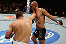 LOS ANGELES, CA - AUGUST 04:  Shogun Rua (L) lands a punch to the throat of Brandon Vera (R) in their light heavyweight bout during the UFC on FOX at Staples Center on August 4, 2012 in Los Angeles, California. Rua defeated Vera by way of TKO in the fourth round.  (Photo by Josh Hedges/Zuffa LLC/Zuffa LLC via Getty Images)