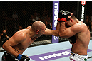 LOS ANGELES, CA - AUGUST 04:  Shogun Rua (R) exchanges stirkes with Brandon Vera (L) during the UFC on FOX at Staples Center on August 4, 2012 in Los Angeles, California. Rua defeated Vera by way of TKO in the fourth round.  (Photo by Josh Hedges/Zuffa LLC/Zuffa LLC via Getty Images)