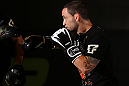 DENVER, CO - AUGUST 08:  Frankie Edgar works out for the media during the UFC 150 open workouts at the Muscle Pharm Sports Science Center on August 8, 2012 in Denver, Colorado. (Photo by Josh Hedges/Zuffa LLC/Zuffa LLC via Getty Images)