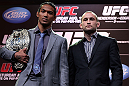 DENVER, CO - AUGUST 09:  (L-R) Opponents Benson Henderson and Frankie Edgar pose for photos during the UFC 150 press conference at the Fillmore Auditorium on August 9, 2012 in Denver, Colorado. (Photo by Josh Hedges/Zuffa LLC/Zuffa LLC via Getty Images)