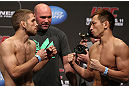DENVER, CO - AUGUST 10:  (L-R) Opponents Nik Lentz and Eiji Mitsuoka face off during the UFC 150 weigh in at Pepsi Center on August 10, 2012 in Denver, Colorado. (Photo by Josh Hedges/Zuffa LLC/Zuffa LLC via Getty Images)
