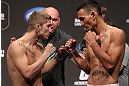 DENVER, CO - AUGUST 10:  (L-R) Opponents Justin Lawrence and Max Holloway face off during the UFC 150 weigh in at Pepsi Center on August 10, 2012 in Denver, Colorado. (Photo by Josh Hedges/Zuffa LLC/Zuffa LLC via Getty Images)