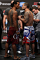 DENVER, CO - AUGUST 10:  (L-R) Opponents Benson Henderson and Frankie Edgar face off during the UFC 150 weigh in at Pepsi Center on August 10, 2012 in Denver, Colorado. (Photo by Josh Hedges/Zuffa LLC/Zuffa LLC via Getty Images)