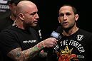 DENVER, CO - AUGUST 10:  (R-L) Frankie Edgar is interviewed by Joe Rogan during the UFC 150 weigh in at Pepsi Center on August 10, 2012 in Denver, Colorado. (Photo by Josh Hedges/Zuffa LLC/Zuffa LLC via Getty Images)