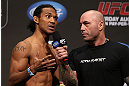 DENVER, CO - AUGUST 10:  (L-R) Benson Henderson is interviewed by Joe Rogan during the UFC 150 weigh in at Pepsi Center on August 10, 2012 in Denver, Colorado. (Photo by Josh Hedges/Zuffa LLC/Zuffa LLC via Getty Images)