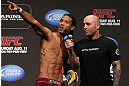 DENVER, CO - AUGUST 10:  (L-R) Benson Henderson is interviewed by Joe Rogan during the UFC 150 weigh in at Pepsi Center on August 10, 2012 in Denver, Colorado. (Photo by Josh Hedges/Zuffa LLC/Zuffa LLC via Getty Images)