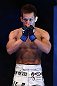 DENVER, CO - AUGUST 11:  Eiji Mitsuoka prepares to enter the Octagon before his bout against Nik Lentz at UFC 150 inside Pepsi Center on August 11, 2012 in Denver, Colorado. (Photo by Josh Hedges/Zuffa LLC/Zuffa LLC via Getty Images)