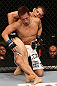 DENVER, CO - AUGUST 11:  (R-L) Nik Lentz and Eiji Mitsuoka grapple during their featherweight bout at UFC 150 inside Pepsi Center on August 11, 2012 in Denver, Colorado. (Photo by Nick Laham/Zuffa LLC/Zuffa LLC via Getty Images)