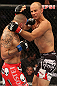 DENVER, CO - AUGUST 11:  (L-R) Michael Kuiper punches Jared Hamman during their middleweight bout at UFC 150 inside Pepsi Center on August 11, 2012 in Denver, Colorado. (Photo by Nick Laham/Zuffa LLC/Zuffa LLC via Getty Images)