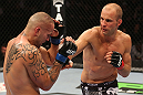 DENVER, CO - AUGUST 11:  (R-L) Jared Hamman punches Michael Kuiper during their middleweight bout at UFC 150 inside Pepsi Center on August 11, 2012 in Denver, Colorado. (Photo by Nick Laham/Zuffa LLC/Zuffa LLC via Getty Images)