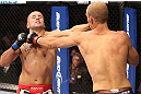 DENVER, CO - AUGUST 11:  (R-L) Jared Hamman punches Michael Kuiper during their middleweight bout at UFC 150 inside Pepsi Center on August 11, 2012 in Denver, Colorado. (Photo by Nick Laham/Zuffa LLC/Zuffa LLC via Getty Images)