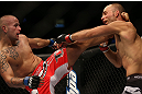 DENVER, CO - AUGUST 11:  (L-R) Michael Kuiper kicks Jared Hamman during their middleweight bout at UFC 150 inside Pepsi Center on August 11, 2012 in Denver, Colorado. (Photo by Josh Hedges/Zuffa LLC/Zuffa LLC via Getty Images)