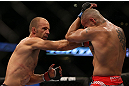 DENVER, CO - AUGUST 11:  (L-R) Jared Hamman punches Michael Kuiper during their middleweight bout at UFC 150 inside Pepsi Center on August 11, 2012 in Denver, Colorado. (Photo by Josh Hedges/Zuffa LLC/Zuffa LLC via Getty Images)