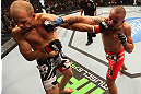 DENVER, CO - AUGUST 11:  (R-L) Michael Kuiper punches Jared Hamman during their middleweight bout at UFC 150 inside Pepsi Center on August 11, 2012 in Denver, Colorado. (Photo by Nick Laham/Zuffa LLC/Zuffa LLC via Getty Images)