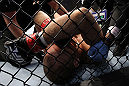 DENVER, CO - AUGUST 11:  Jared Hamman lies on the canvas after being knocked out by Michael Kuiper during their middleweight bout at UFC 150 inside Pepsi Center on August 11, 2012 in Denver, Colorado. (Photo by Josh Hedges/Zuffa LLC/Zuffa LLC via Getty Images)