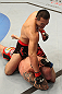 DENVER, CO - AUGUST 11:  Yushin Okami (top) punches down at Buddy Roberts during their middleweight bout at UFC 150 inside Pepsi Center on August 11, 2012 in Denver, Colorado. (Photo by Nick Laham/Zuffa LLC/Zuffa LLC via Getty Images)