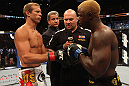 DENVER, CO - AUGUST 11:  (L-R) Donald "Cowboy" Cerrone and Melvin Guillard receive final instructions from the referee before their lightweight bout at UFC 150 inside Pepsi Center on August 11, 2012 in Denver, Colorado. (Photo by Nick Laham/Zuffa LLC/Zuffa LLC via Getty Images)