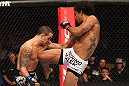 DENVER, CO - AUGUST 11:  (R-L) Benson Henderson kicks Frankie Edgar during their lightweight championship bout at UFC 150 inside Pepsi Center on August 11, 2012 in Denver, Colorado. (Photo by Nick Laham/Zuffa LLC/Zuffa LLC via Getty Images)