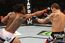 DENVER, CO - AUGUST 11:  (L-R) Benson Henderson punches Frankie Edgar during their lightweight championship bout at UFC 150 inside Pepsi Center on August 11, 2012 in Denver, Colorado. (Photo by Nick Laham/Zuffa LLC/Zuffa LLC via Getty Images)