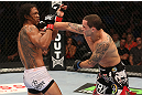 DENVER, CO - AUGUST 11:  (R-L) Frankie Edgar punches Benson Henderson during their lightweight championship bout at UFC 150 inside Pepsi Center on August 11, 2012 in Denver, Colorado. (Photo by Nick Laham/Zuffa LLC/Zuffa LLC via Getty Images)