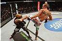 DENVER, CO - AUGUST 11:  (R-L) Donald "Cowboy" Cerrone kicks Melvin Guillard during their lightweight bout at UFC 150 inside Pepsi Center on August 11, 2012 in Denver, Colorado. (Photo by Nick Laham/Zuffa LLC/Zuffa LLC via Getty Images)