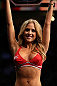 DENVER, CO - AUGUST 11:  UFC Octagon Girl Brittney Palmer introduces a round at UFC 150 inside Pepsi Center on August 11, 2012 in Denver, Colorado. (Photo by Josh Hedges/Zuffa LLC/Zuffa LLC via Getty Images)