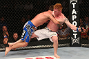 DENVER, CO - AUGUST 11:  (L-R) Jake Shields takes down Ed Herman during their middleweight bout at UFC 150 inside Pepsi Center on August 11, 2012 in Denver, Colorado. (Photo by Nick Laham/Zuffa LLC/Zuffa LLC via Getty Images)