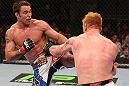 DENVER, CO - AUGUST 11:  (L-R) Jake Shields kicks Ed Herman during their middleweight bout at UFC 150 inside Pepsi Center on August 11, 2012 in Denver, Colorado. (Photo by Nick Laham/Zuffa LLC/Zuffa LLC via Getty Images)