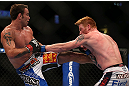 DENVER, CO - AUGUST 11:  (L-R) Jake Shields kicks Ed Herman during their middleweight bout at UFC 150 inside Pepsi Center on August 11, 2012 in Denver, Colorado. (Photo by Josh Hedges/Zuffa LLC/Zuffa LLC via Getty Images)