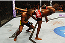 ATLANTA, GA - APRIL 21:  Jon Jones (R) kicks Rashad Evans during their light heavyweight title bout for UFC 145 at Philips Arena on April 21, 2012 in Atlanta, Georgia.  (Photo by Al Bello/Zuffa LLC/Zuffa LLC via Getty Images)