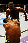 ATLANTA, GA - APRIL 21:  Jon Jones (back) knees Rashad Evans during their light heavyweight title bout for UFC 145 at Philips Arena on April 21, 2012 in Atlanta, Georgia.  (Photo by Al Bello/Zuffa LLC/Zuffa LLC via Getty Images) *** Local Caption *** Jon Jones; Rashad Evans