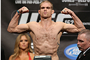 TORONTO, CANADA - SEPTEMBER 21: Evan Dunham weighs in during the UFC 152 weigh in at Mattamy Athletic Centre at the Gardens on September 21, 2012 in Toronto, Ontario, Canada. (Photo by Josh Hedges/Zuffa LLC/Zuffa LLC via Getty Images)