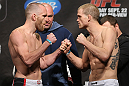 TORONTO, CANADA - SEPTEMBER 21: (L-R) Opponents T.J. Grant and Evan Dunham face off during the UFC 152 weigh in at Mattamy Athletic Centre at the Gardens on September 21, 2012 in Toronto, Ontario, Canada. (Photo by Josh Hedges/Zuffa LLC/Zuffa LLC via Getty Images)