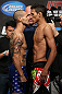 TORONTO, CANADA - SEPTEMBER 21: (L-R) Opponents Cub Swanson and Charles Oliveira face off during the UFC 152 weigh in at Mattamy Athletic Centre at the Gardens on September 21, 2012 in Toronto, Ontario, Canada. (Photo by Josh Hedges/Zuffa LLC/Zuffa LLC via Getty Images)