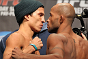 TORONTO, CANADA - SEPTEMBER 21: (L-R) Opponents Joseph Benavidez and Demetrious Johnson face off during the UFC 152 weigh in at Mattamy Athletic Centre at the Gardens on September 21, 2012 in Toronto, Ontario, Canada. (Photo by Mike Roach/Zuffa LLC/Zuffa LLC via Getty Images)
