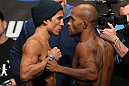 TORONTO, CANADA - SEPTEMBER 21: (L-R) Opponents Joseph Benavidez and Demetrious Johnson face off during the UFC 152 weigh in at Mattamy Athletic Centre at the Gardens on September 21, 2012 in Toronto, Ontario, Canada. (Photo by Josh Hedges/Zuffa LLC/Zuffa LLC via Getty Images)