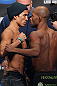 TORONTO, CANADA - SEPTEMBER 21: (L-R) Opponents Joseph Benavidez and Demetrious Johnson face off during the UFC 152 weigh in at Mattamy Athletic Centre at the Gardens on September 21, 2012 in Toronto, Ontario, Canada. (Photo by Josh Hedges/Zuffa LLC/Zuffa LLC via Getty Images)