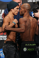 TORONTO, CANADA - SEPTEMBER 21: (L-R) Opponents Joseph Benavidez and Demetrious Johnson face off during the UFC 152 weigh in at Mattamy Athletic Centre at the Gardens on September 21, 2012 in Toronto, Ontario, Canada. (Photo by Josh Hedges/Zuffa LLC/Zuffa LLC via Getty Images)