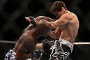 TORONTO, CANADA - SEPTEMBER 22: (L-R) Marcus Brimage punches Jimy Hettes during their featherweight bout at UFC 152 inside Air Canada Centre on September 22, 2012 in Toronto, Ontario, Canada. (Photo by Josh Hedges/Zuffa LLC/Zuffa LLC via Getty Images)