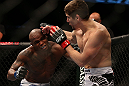 TORONTO, CANADA - SEPTEMBER 22: (R-L) Jimy Hettes punches Marcus Brimage during their featherweight bout at UFC 152 inside Air Canada Centre on September 22, 2012 in Toronto, Ontario, Canada. (Photo by Josh Hedges/Zuffa LLC/Zuffa LLC via Getty Images)