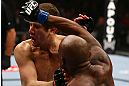 TORONTO, CANADA - SEPTEMBER 22: (R-L) Marcus Brimage punches Jimy Hettes during their featherweight bout at UFC 152 inside Air Canada Centre on September 22, 2012 in Toronto, Ontario, Canada. (Photo by Al Bello/Zuffa LLC/Zuffa LLC via Getty Images)