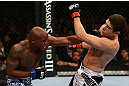 TORONTO, CANADA - SEPTEMBER 22: (L-R) Marcus Brimage punches Jimy Hettes during their featherweight bout at UFC 152 inside Air Canada Centre on September 22, 2012 in Toronto, Ontario, Canada. (Photo by Al Bello/Zuffa LLC/Zuffa LLC via Getty Images)