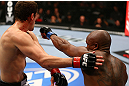 TORONTO, CANADA - SEPTEMBER 22: (R-L) Marcus Brimage punches Jimy Hettes during their featherweight bout at UFC 152 inside Air Canada Centre on September 22, 2012 in Toronto, Ontario, Canada. (Photo by Al Bello/Zuffa LLC/Zuffa LLC via Getty Images)