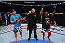 TORONTO, CANADA - SEPTEMBER 22: Marcus Brimage (R) reacts after defeating Jimy Hettes (L) during their featherweight bout at UFC 152 inside Air Canada Centre on September 22, 2012 in Toronto, Ontario, Canada. (Photo by Al Bello/Zuffa LLC/Zuffa LLC via Getty Images)