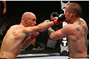 TORONTO, CANADA - SEPTEMBER 22: (L-R) Sean Pierson punches Lance Benoist during their welterweight bout at UFC 152 inside Air Canada Centre on September 22, 2012 in Toronto, Ontario, Canada. (Photo by Al Bello/Zuffa LLC/Zuffa LLC via Getty Images)