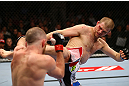 TORONTO, CANADA - SEPTEMBER 22: (R-L) Evan Dunham kicks T.J. Grant during their lightweight bout at UFC 152 inside Air Canada Centre on September 22, 2012 in Toronto, Ontario, Canada. (Photo by Al Bello/Zuffa LLC/Zuffa LLC via Getty Images)