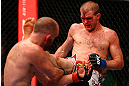 TORONTO, CANADA - SEPTEMBER 22: (R-L) Evan Dunham kicks T.J. Grant during their lightweight bout at UFC 152 inside Air Canada Centre on September 22, 2012 in Toronto, Ontario, Canada. (Photo by Al Bello/Zuffa LLC/Zuffa LLC via Getty Images)