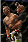 TORONTO, CANADA - SEPTEMBER 22: (R-L) Referee Yves Lavigne pulls Cub Swanson away after his knockout of Charles Oliveira during their featherweight bout at UFC 152 inside Air Canada Centre on September 22, 2012 in Toronto, Ontario, Canada. (Photo by Josh Hedges/Zuffa LLC/Zuffa LLC via Getty Images)